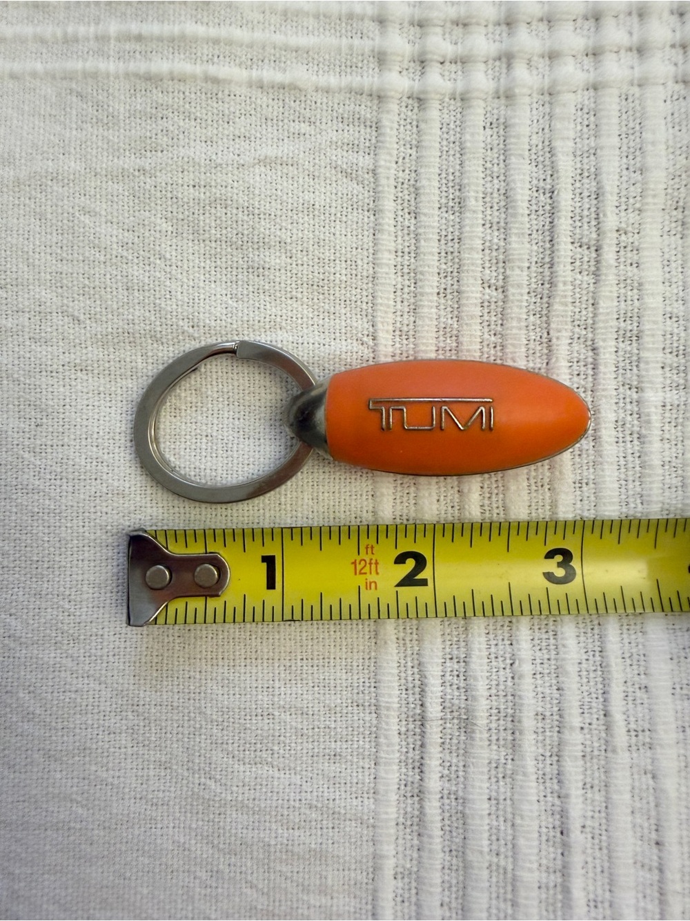 Tumi Orange Oval Logo Key Fob with Metal Ring
